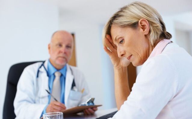 A woman with signs of anogenital warts at the doctor